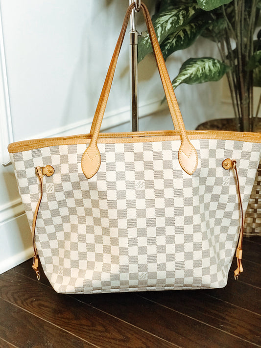 TWO ll: Louis Vuitton Neverfull Tote.