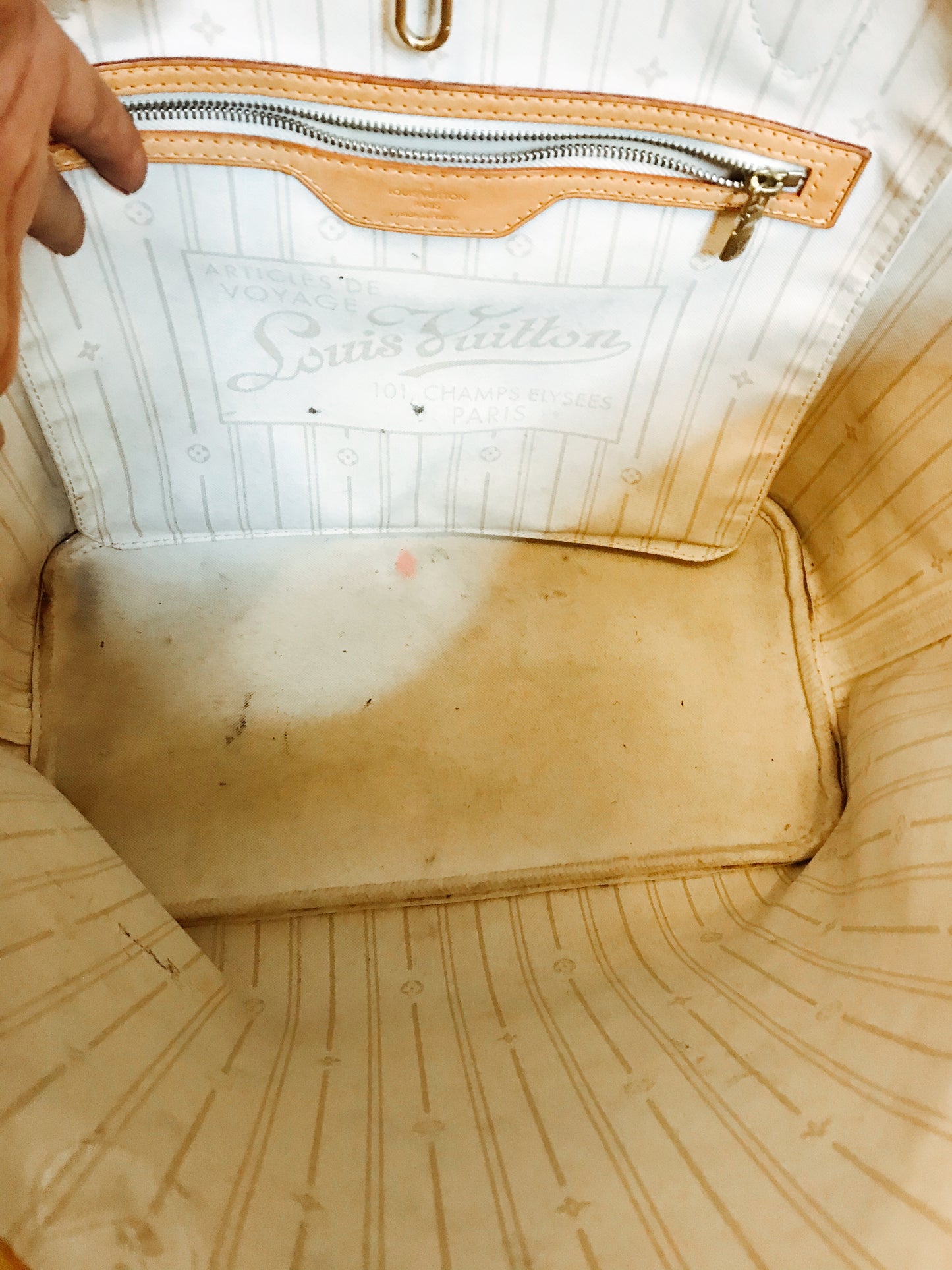 TWO ll: Louis Vuitton Neverfull Tote.