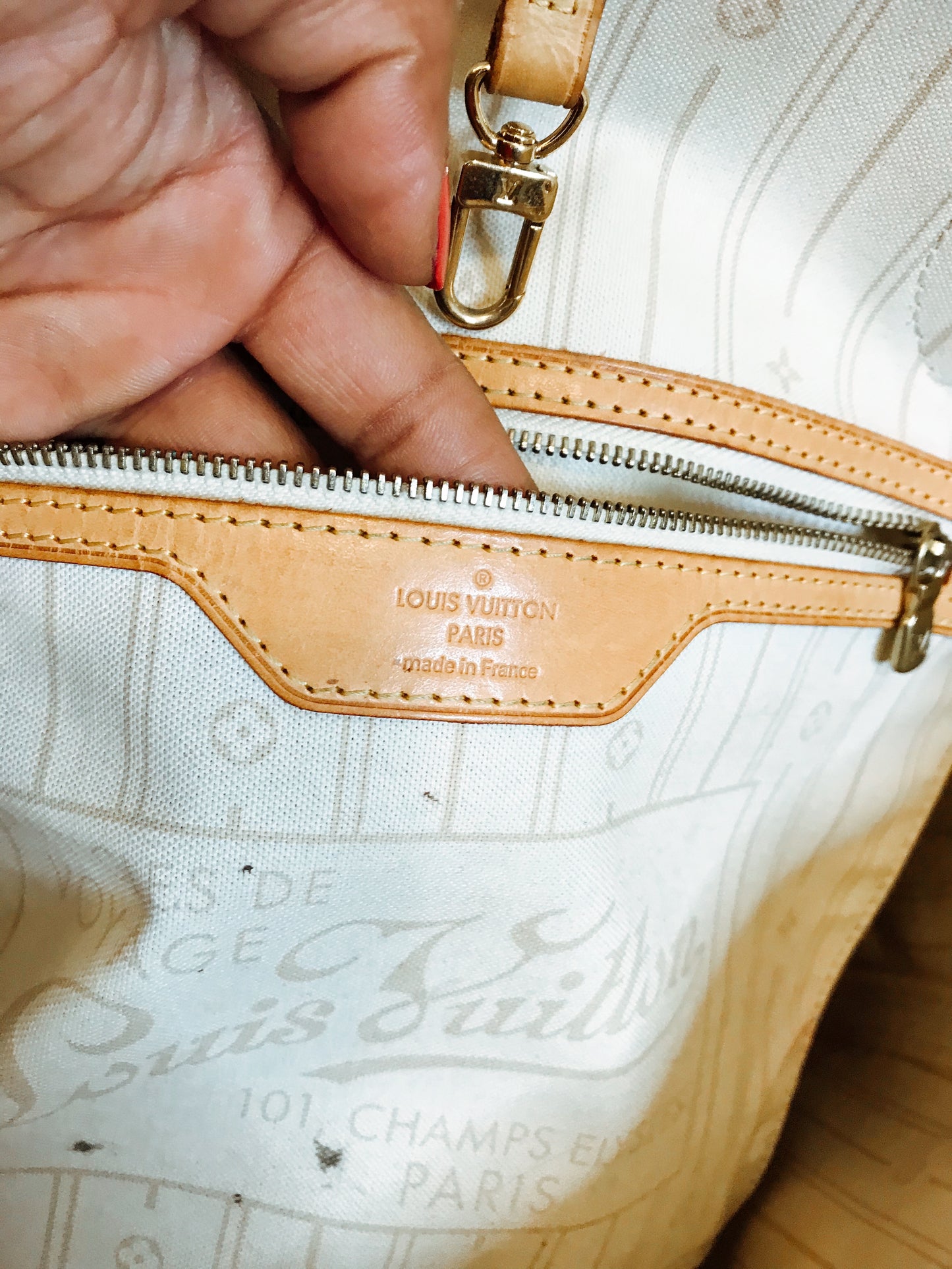 TWO ll: Louis Vuitton Neverfull Tote.